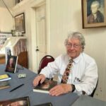 Hans Niederstrasser at a recent book signing. Photo by Ann Genader