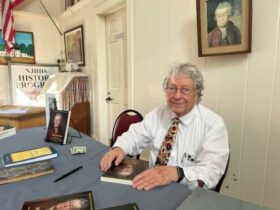 Hans Niederstrasser at a recent book signing. Photo by Ann Genader