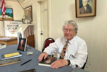 Hans Niederstrasser at a recent book signing. Photo by Ann Genader